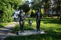 Bronze sculpture by Hans-Detlev Hennig `Family`, from 1965, on the Ernst-Grube-StraÃÅ¸e. Berlin, Germany